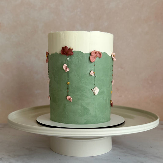 Modern cake with minimalist floral drip strings